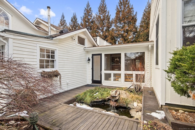 exterior space featuring a sunroom