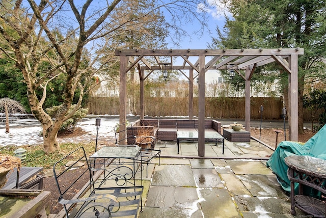 view of patio featuring an outdoor hangout area and a pergola