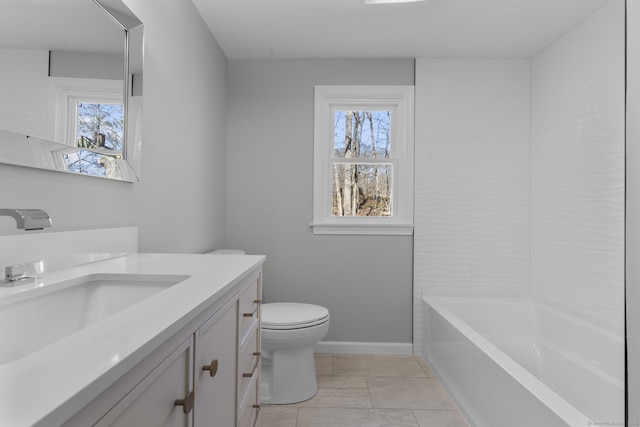 full bathroom with plenty of natural light, vanity, toilet, and a bathing tub