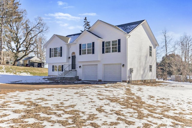 raised ranch with a garage