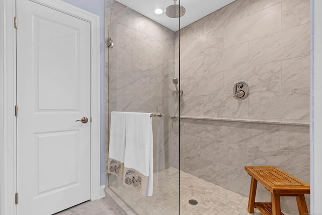 bathroom featuring tiled shower