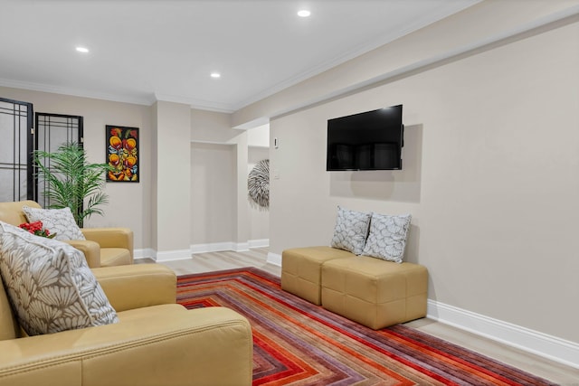 living room featuring crown molding and wood-type flooring