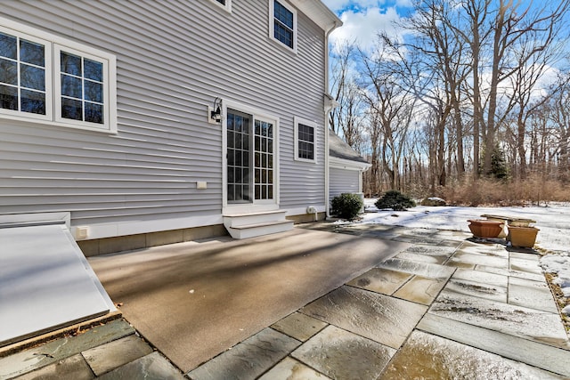 view of snow covered patio