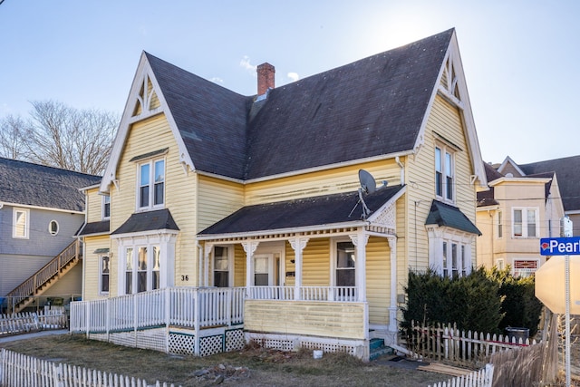 victorian-style house with a porch