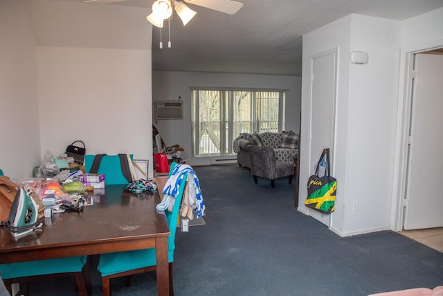 dining space with an AC wall unit, carpet flooring, and ceiling fan