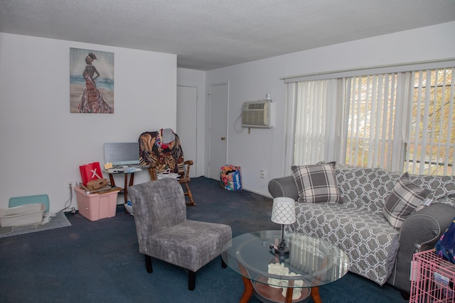 carpeted living room featuring a wall mounted AC and a textured ceiling