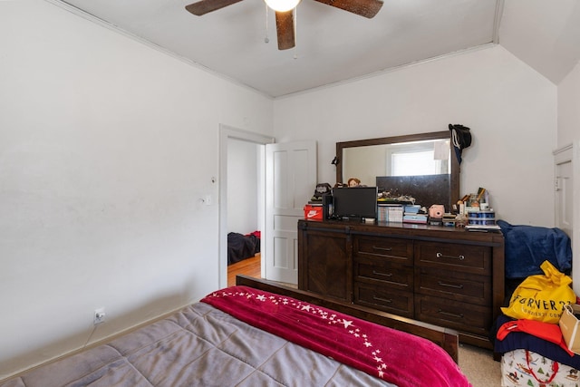 bedroom featuring ceiling fan and lofted ceiling