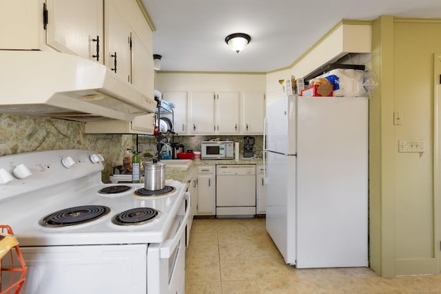 kitchen featuring light tile patterned floors, white appliances, decorative backsplash, and white cabinets