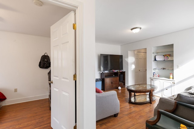 living room with dark wood-type flooring