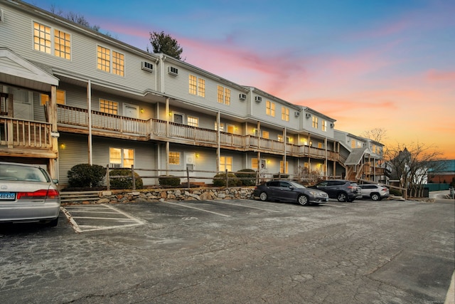 view of outdoor building at dusk