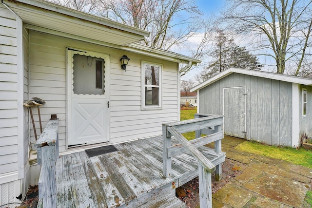 wooden deck with a storage unit