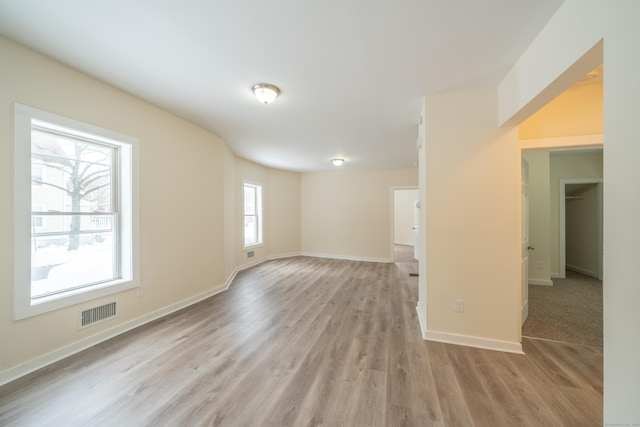 unfurnished room featuring light hardwood / wood-style flooring