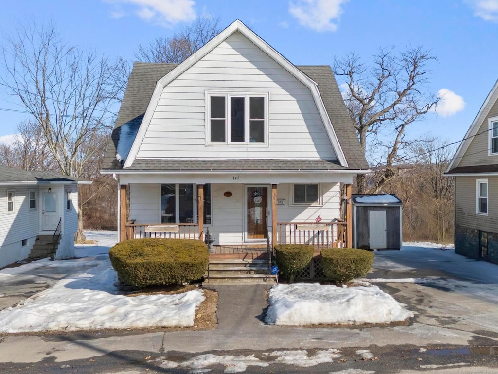 145 Geddes Ter, Waterbury, CT 06708 - colonial inspired home with roof with shingles, a shed, a porch, and a gambrel roof
