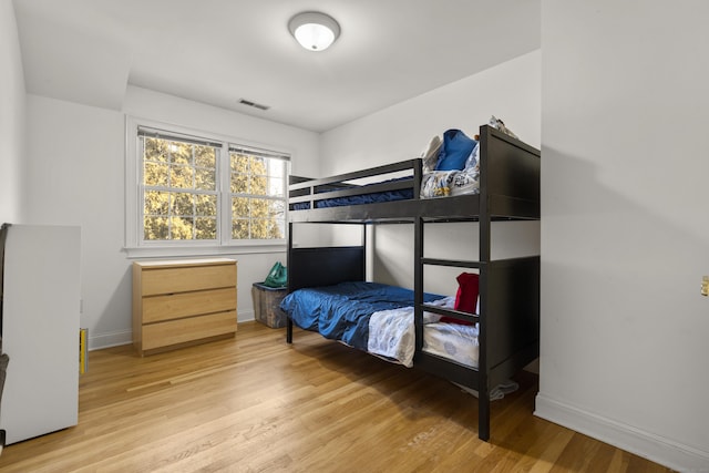 bedroom featuring light wood-type flooring