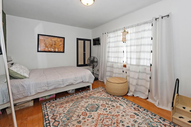 bedroom featuring hardwood / wood-style flooring