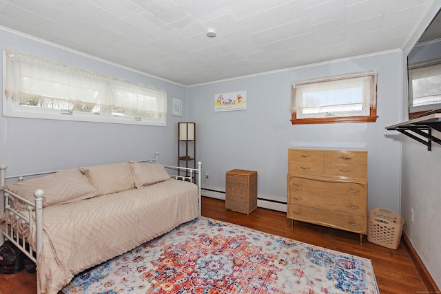 bedroom featuring a baseboard radiator, ornamental molding, and dark hardwood / wood-style flooring