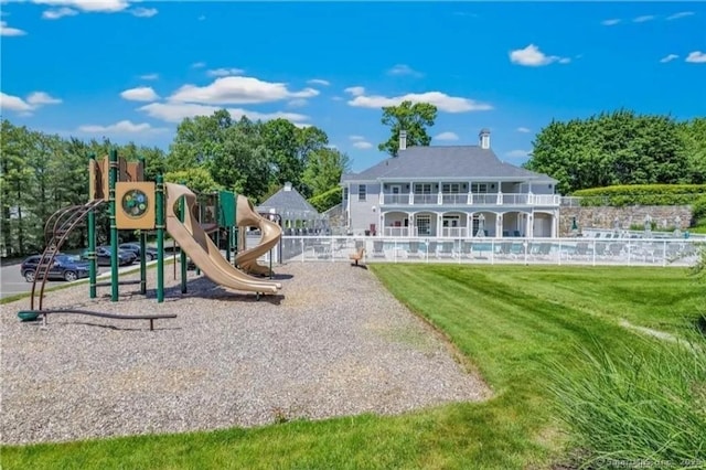 view of playground featuring a yard