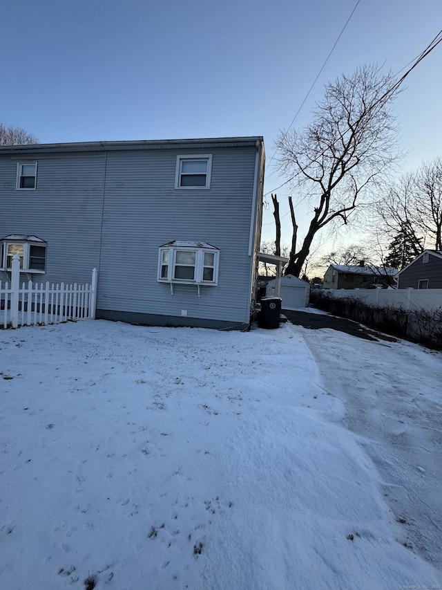 view of snow covered property