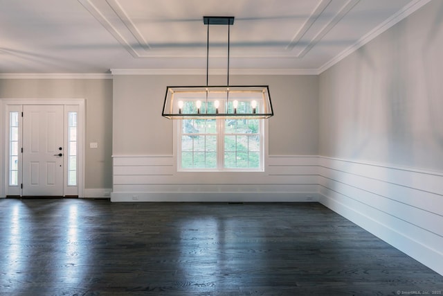 unfurnished dining area featuring ornamental molding and dark hardwood / wood-style flooring