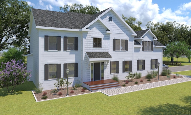 view of front of home with a shingled roof and a front lawn