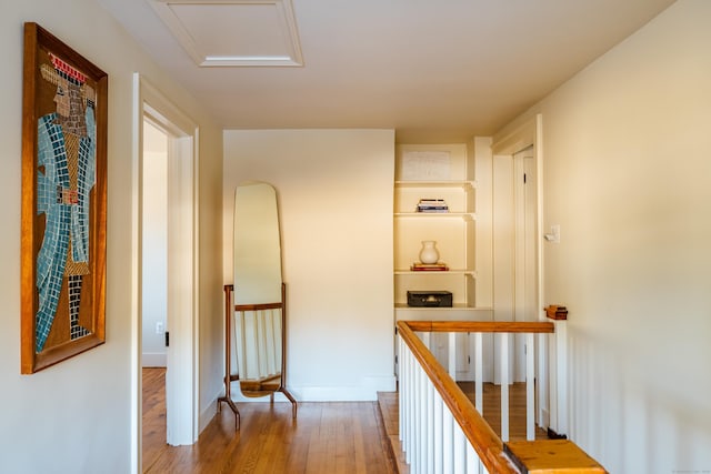 corridor featuring hardwood / wood-style flooring