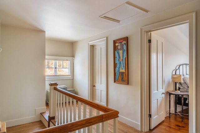 hall with light hardwood / wood-style flooring