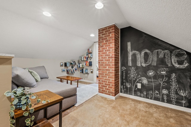 interior space with carpet floors, a textured ceiling, and vaulted ceiling