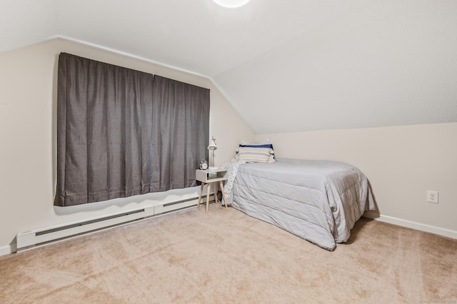 bedroom featuring a baseboard radiator, vaulted ceiling, and light carpet