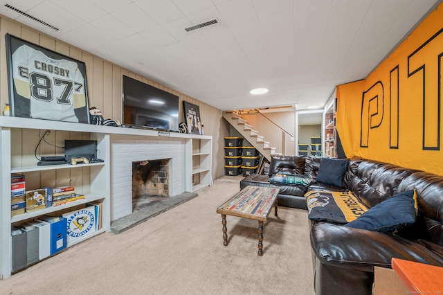 living room featuring a fireplace and light colored carpet