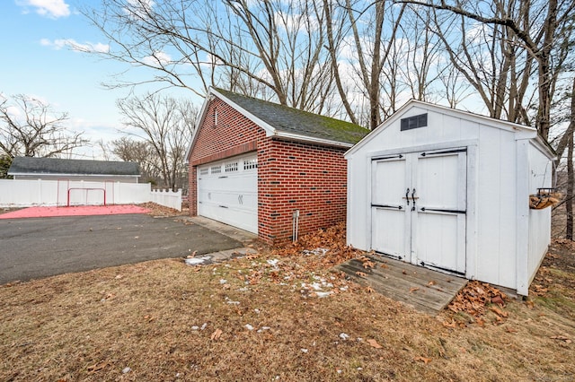 view of outdoor structure featuring a garage