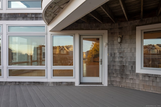 property entrance featuring a deck