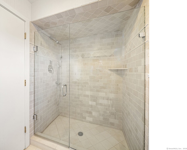 bathroom featuring an enclosed shower