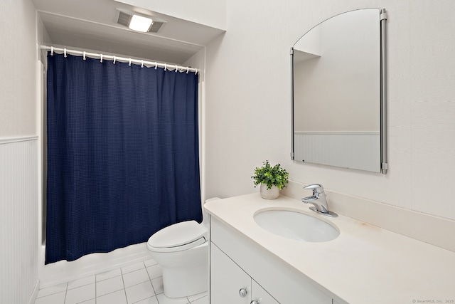 full bathroom featuring tile patterned flooring, vanity, shower / bath combination with curtain, and toilet