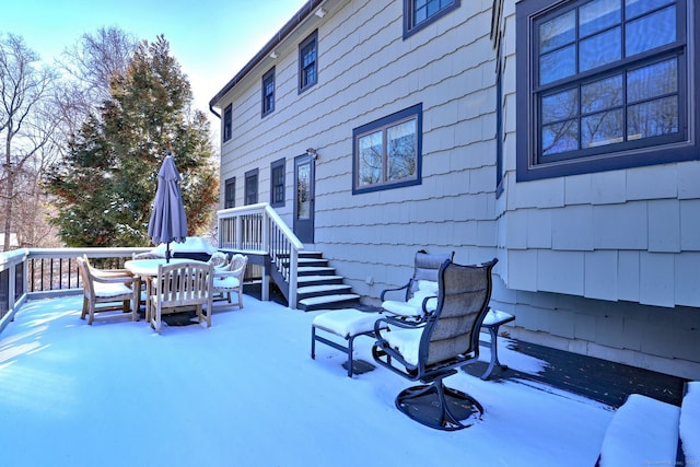 view of snow covered patio