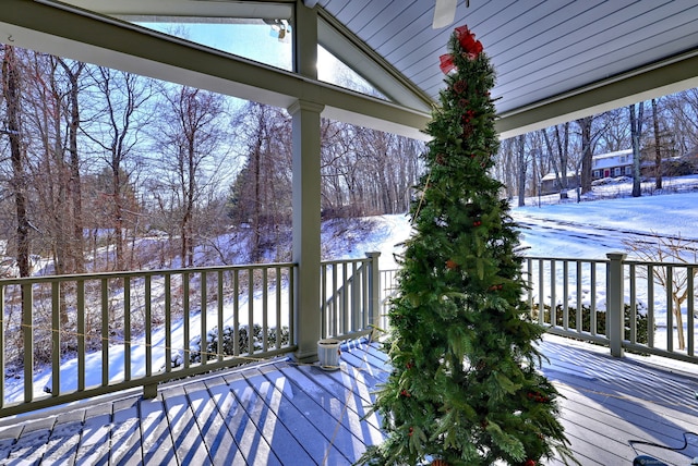 view of snow covered deck