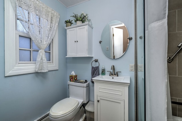 bathroom featuring vanity, a shower with shower curtain, and toilet