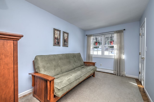 sitting room featuring baseboard heating