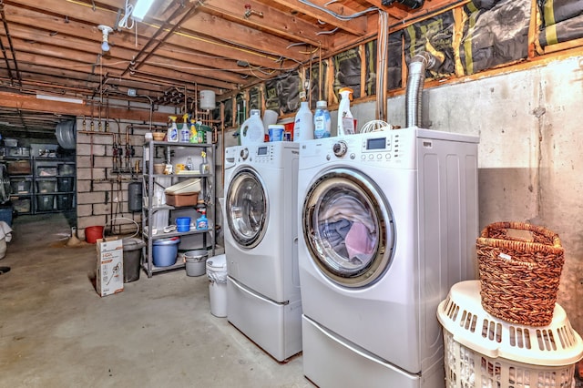 washroom featuring washer and dryer