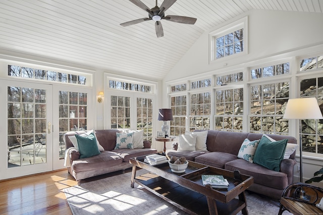 sunroom / solarium with french doors, wooden ceiling, vaulted ceiling, and ceiling fan