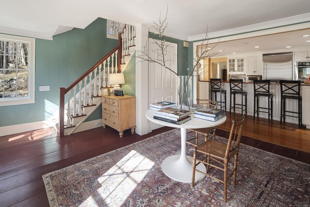 247 Mill Rd, New Canaan, CT 06840 - dining room with stairway, wood finished floors, and baseboards