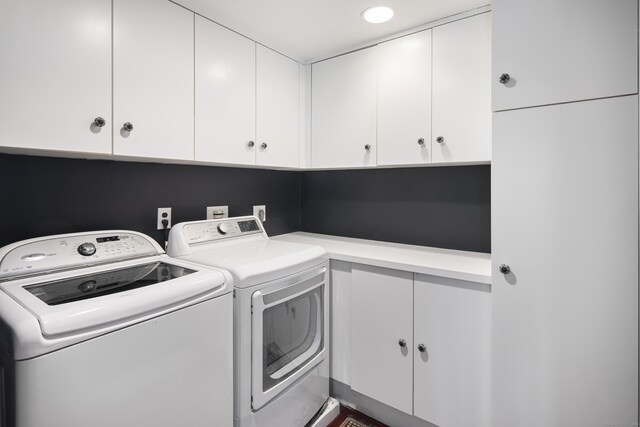 laundry room featuring cabinet space, recessed lighting, and independent washer and dryer