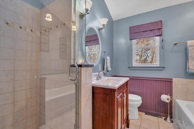 full bathroom featuring tile patterned floors, vanity, toilet, and separate shower and tub