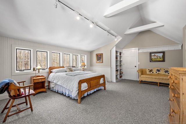 bedroom featuring vaulted ceiling with beams and carpet floors