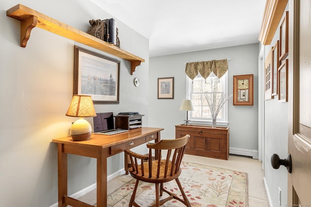 office area featuring baseboards, baseboard heating, and light colored carpet