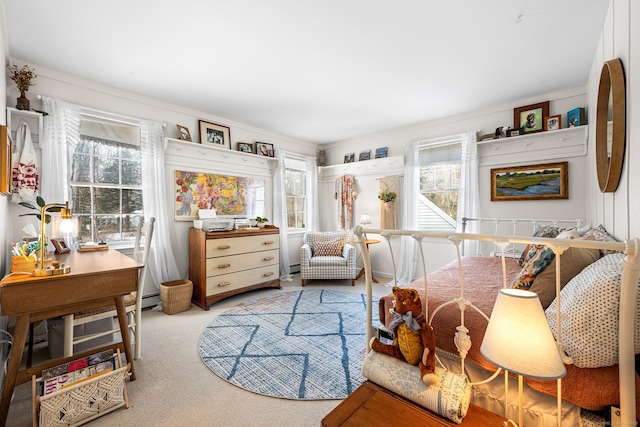 carpeted bedroom featuring multiple windows