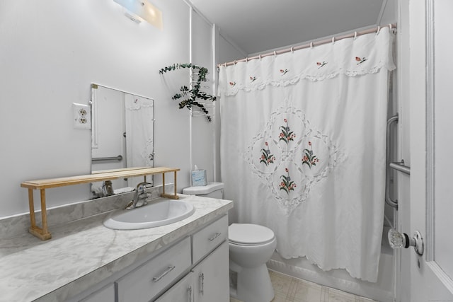 full bathroom featuring shower / tub combo, vanity, and toilet