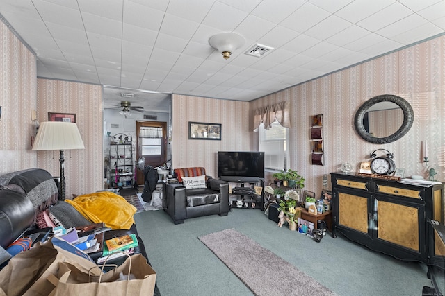 living room with carpet and ceiling fan