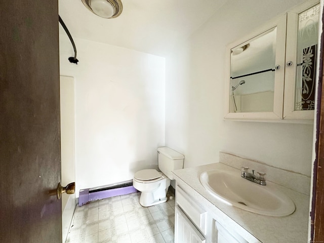 full bath with a shower, visible vents, toilet, baseboard heating, and vanity