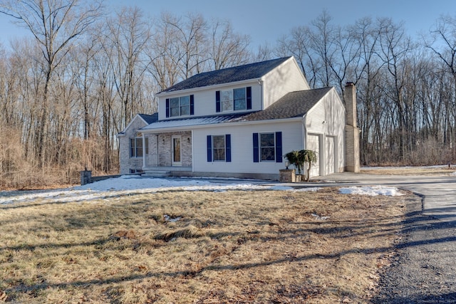 view of front property with a garage