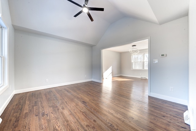 unfurnished living room with lofted ceiling, dark wood-type flooring, and ceiling fan